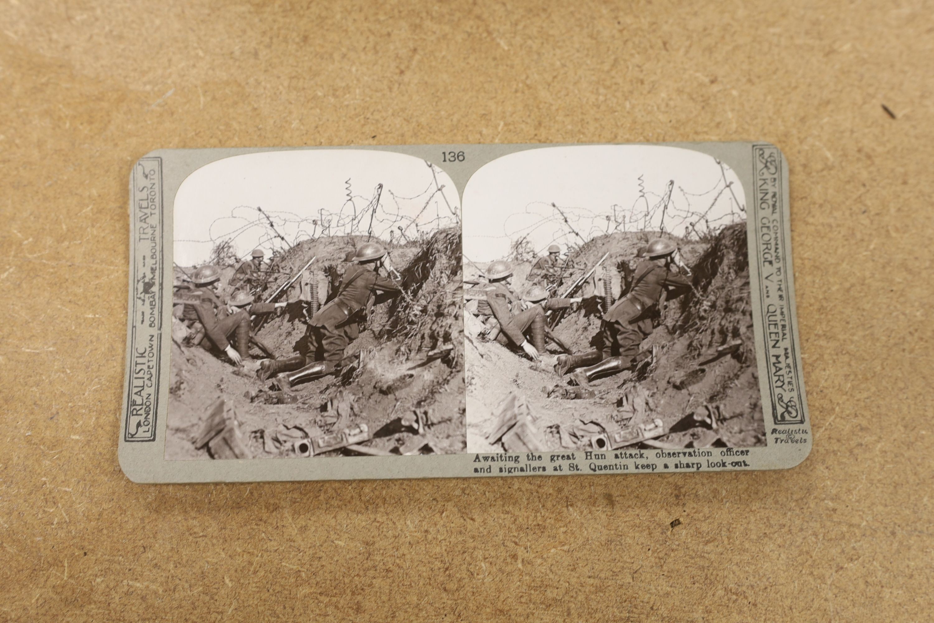 A set of The Great War stereoscopic slides, in case, and a viewer, 31 cms long.